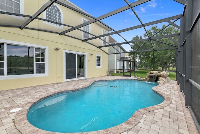850 Spring Oak Cir, Orlando, FL 32828 - outdoor pool with a patio and glass enclosure