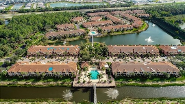 20310 Estero Gardens Cir Unit 203, Estero, FL 33928 - aerial overview of property's location with a large body of water and nearby suburban area