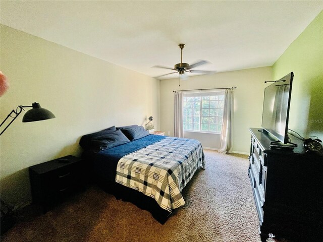 20310 Estero Gardens Cir Unit 203, Estero, FL 33928 - bedroom with carpet flooring, ceiling fan, and baseboards