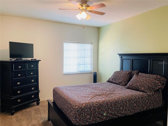 20310 Estero Gardens Cir Unit 203, Estero, FL 33928 - bedroom featuring carpet floors and a ceiling fan