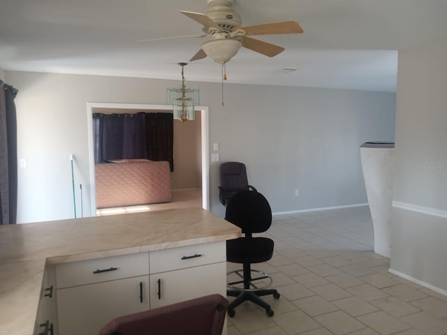 5052 Trekell St, North Port, FL 34287 - office space with baseboards, ceiling fan, and light tile patterned floors