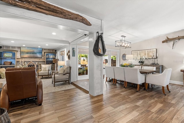 2105 Fosgate Dr, Winter Park, FL 32789 - interior space with baseboards, recessed lighting, wood finished floors, and a notable chandelier