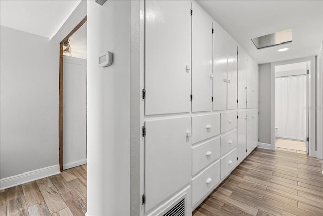 2105 Fosgate Dr, Winter Park, FL 32789 - corridor featuring light wood finished floors and baseboards
