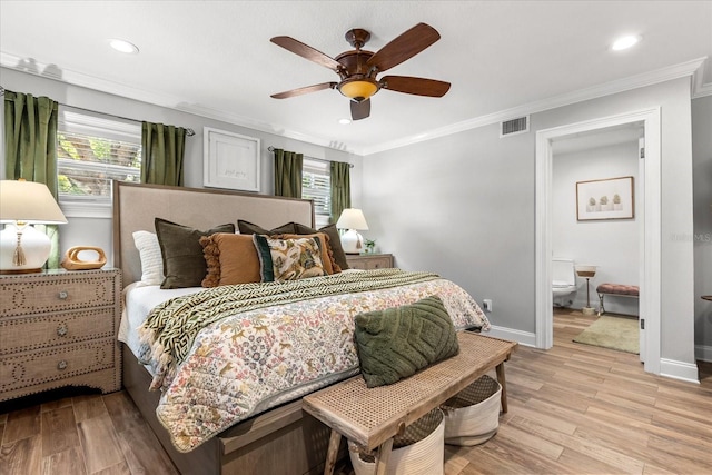 2105 Fosgate Dr, Winter Park, FL 32789 - bedroom featuring crown molding, visible vents, light wood-style flooring, and baseboards