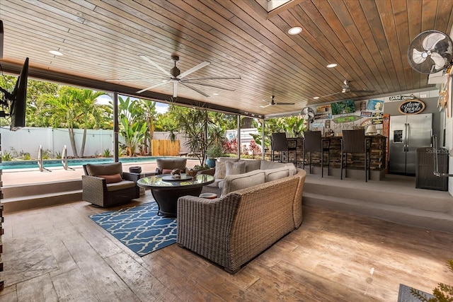 2105 Fosgate Dr, Winter Park, FL 32789 - view of patio / terrace with a fenced in pool, ceiling fan, an outdoor living space, and a fenced backyard