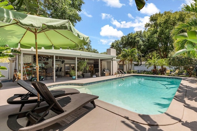 2105 Fosgate Dr, Winter Park, FL 32789 - view of swimming pool with fence, a fenced in pool, and a patio area