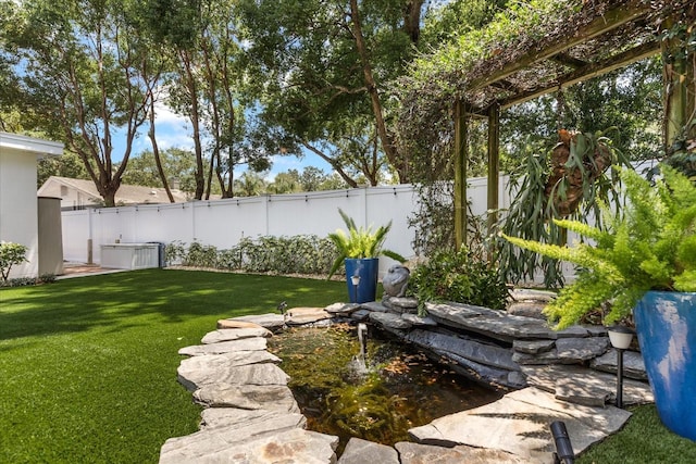 2105 Fosgate Dr, Winter Park, FL 32789 - view of yard featuring a small pond and a fenced backyard