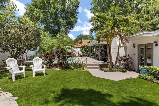 2105 Fosgate Dr, Winter Park, FL 32789 - view of yard featuring a patio, french doors, and a fenced in pool