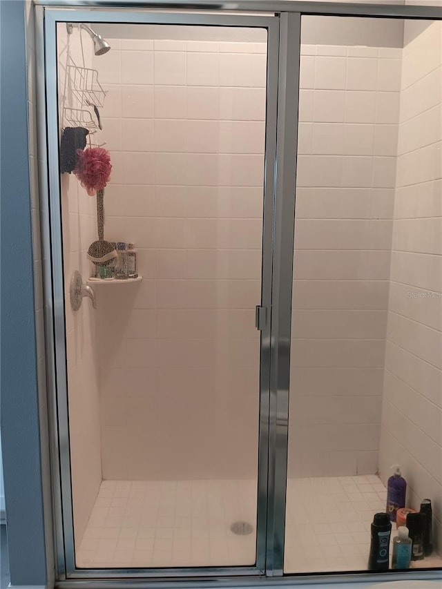 full bathroom with a stall shower
