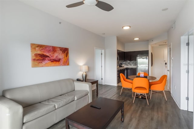 225 Celebration Pl Unit 401, Kissimmee, FL 34747 - living room featuring dark wood finished floors, a ceiling fan, recessed lighting, and baseboards