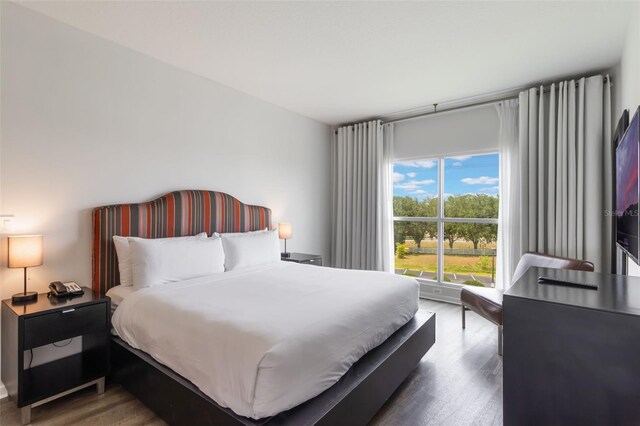 225 Celebration Pl Unit 401, Kissimmee, FL 34747 - bedroom featuring wood finished floors