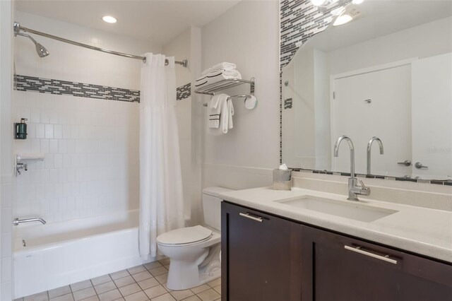 225 Celebration Pl Unit 401, Kissimmee, FL 34747 - full bathroom featuring tile patterned flooring, toilet, shower / bathtub combination with curtain, vanity, and recessed lighting