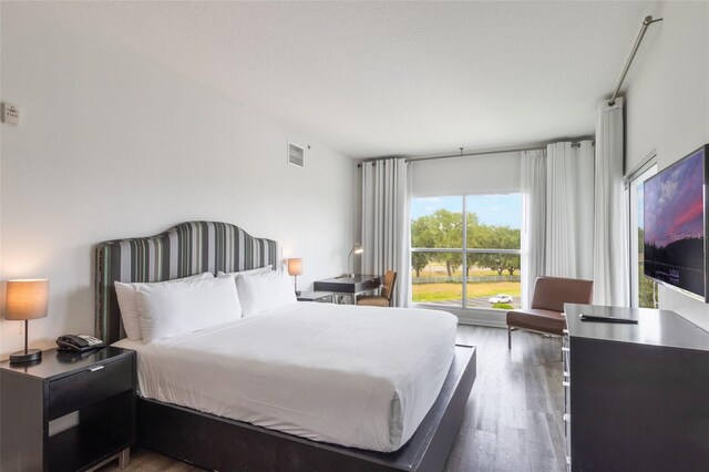 225 Celebration Pl Unit 401, Kissimmee, FL 34747 - bedroom with wood finished floors