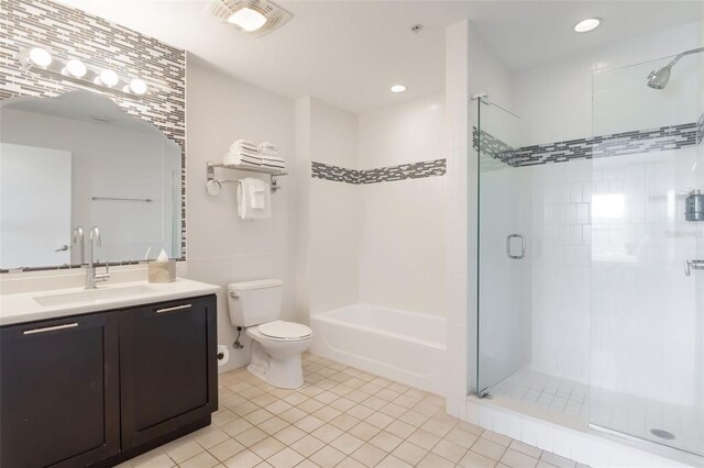 225 Celebration Pl Unit 401, Kissimmee, FL 34747 - full bath with a tile shower, toilet, tile patterned flooring, vanity, and a bath