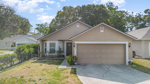 single story home with fence, a garage, stucco siding, a front yard, and driveway