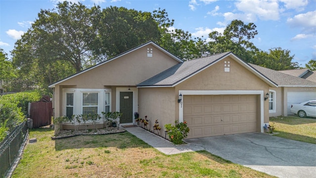ranch-style home with a garage, stucco siding, driveway, and fence