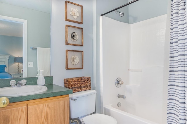 bathroom with toilet, shower / bath combination with curtain, ensuite bathroom, and vanity