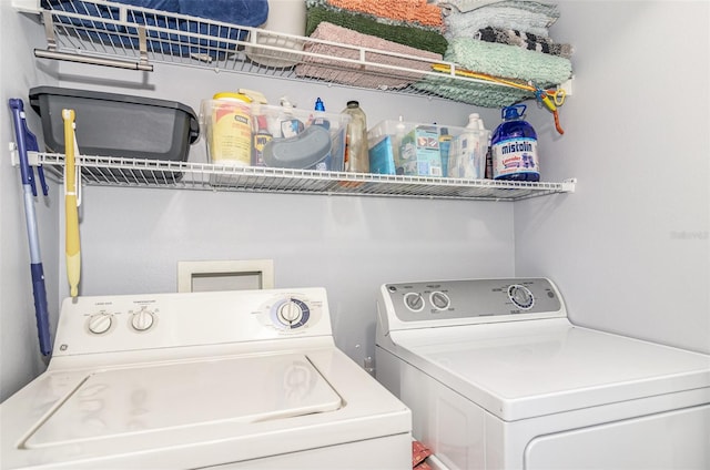 laundry area with laundry area and washing machine and dryer