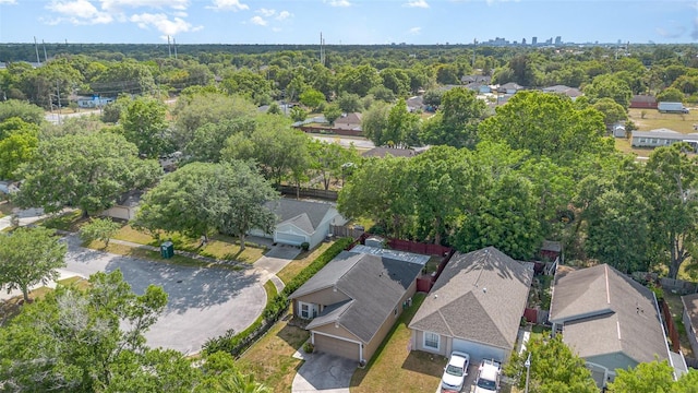 birds eye view of property with a residential view