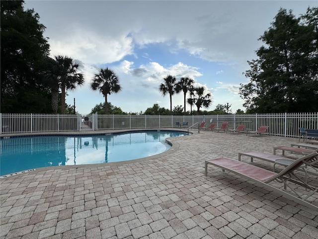 6336 Buford St Unit 307, Orlando, FL 32835 - pool featuring a patio and fence