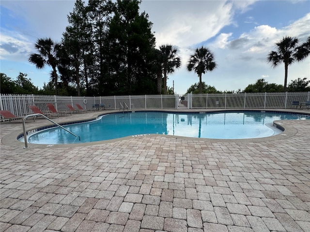 6336 Buford St Unit 307, Orlando, FL 32835 - pool featuring a patio and fence