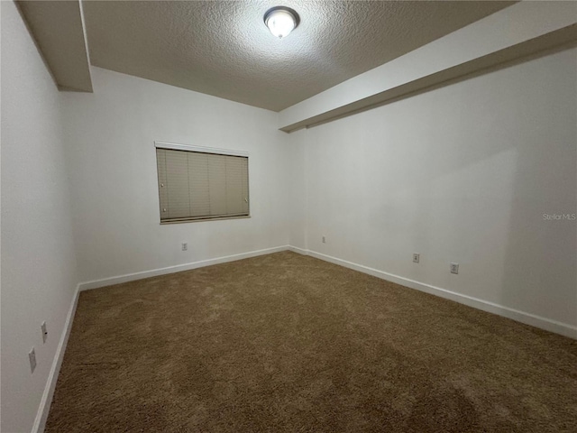 6336 Buford St Unit 307, Orlando, FL 32835 - carpeted empty room featuring a textured ceiling and baseboards