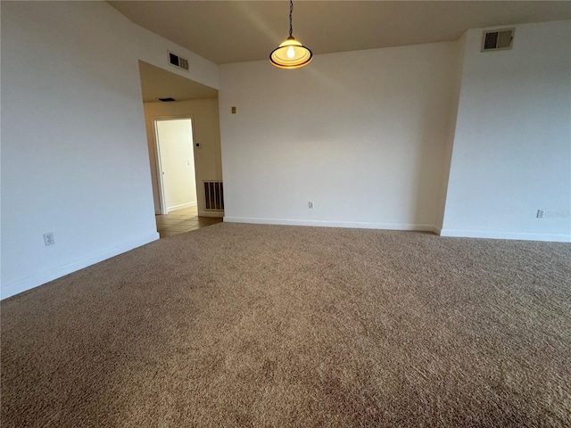 6336 Buford St Unit 307, Orlando, FL 32835 - carpeted spare room featuring baseboards and visible vents