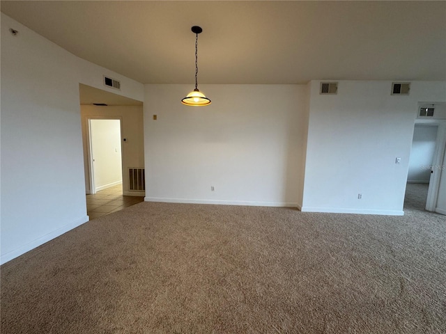 6336 Buford St Unit 307, Orlando, FL 32835 - carpeted empty room with visible vents and baseboards