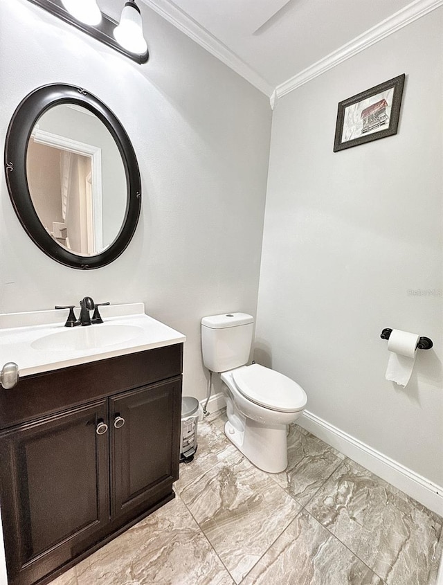 2904 Cayenne Ave, Pembroke Pines, FL 33026 - bathroom featuring marble finish floor, ornamental molding, toilet, vanity, and baseboards