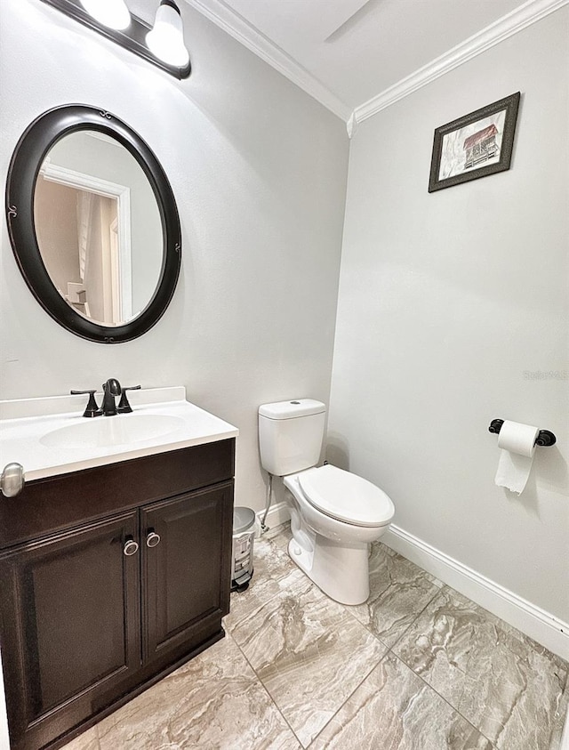 2904 Cayenne Ave, Pembroke Pines, FL 33026 - half bathroom with baseboards, toilet, ornamental molding, vanity, and marble finish floor