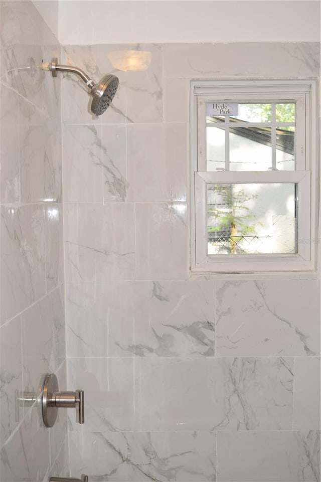 full bath featuring a shower