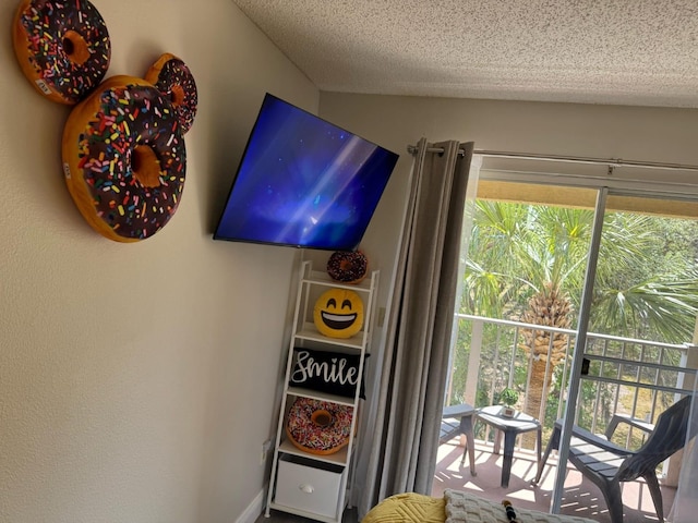 6403 Parc Corniche Dr Unit 4308, Orlando, FL 32821 - details featuring baseboards and a textured ceiling