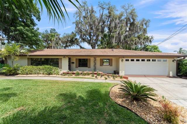 195 E Faith Ter, Maitland, FL 32751 - single story home featuring concrete driveway, an attached garage, and a front yard