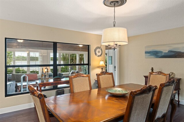195 E Faith Ter, Maitland, FL 32751 - dining space with baseboards and dark wood-type flooring