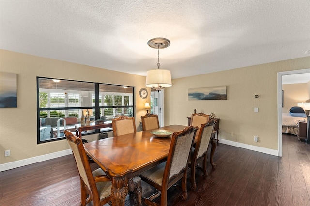 195 E Faith Ter, Maitland, FL 32751 - dining space featuring baseboards, a textured ceiling, dark wood finished floors, and a chandelier