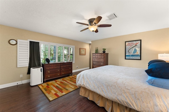 195 E Faith Ter, Maitland, FL 32751 - bedroom with baseboards, a ceiling fan, dark wood finished floors, and visible vents
