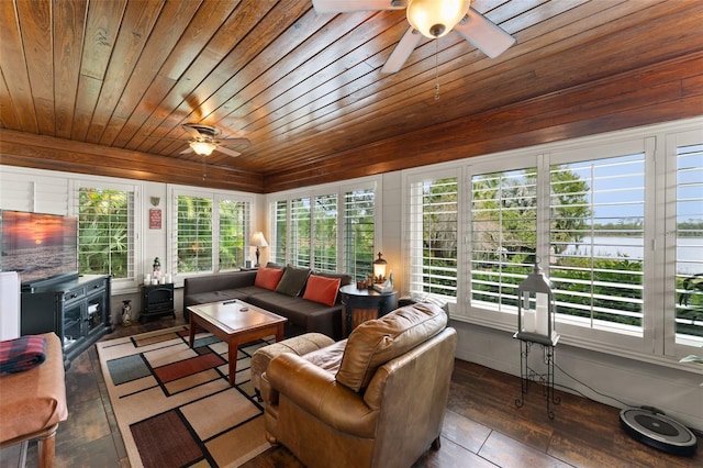 195 E Faith Ter, Maitland, FL 32751 - sunroom / solarium featuring a wood stove, a water view, hardwood / wood-style floors, and wooden ceiling