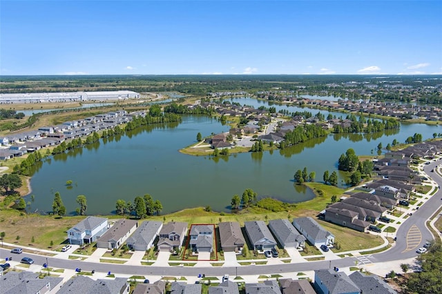 aerial view featuring a residential view and a water view