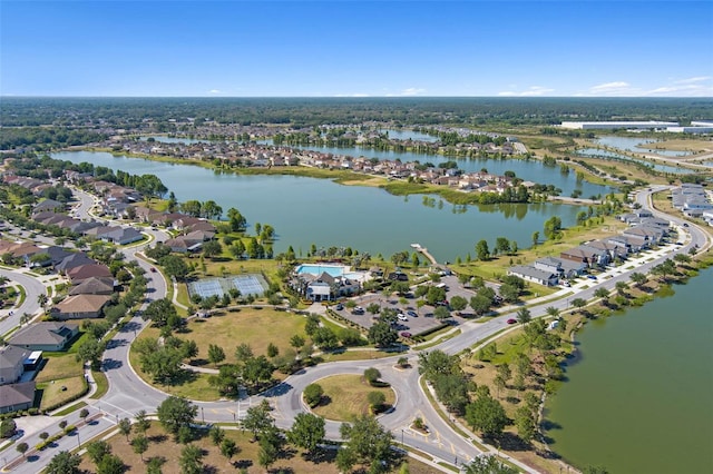 birds eye view of property featuring a residential view and a water view