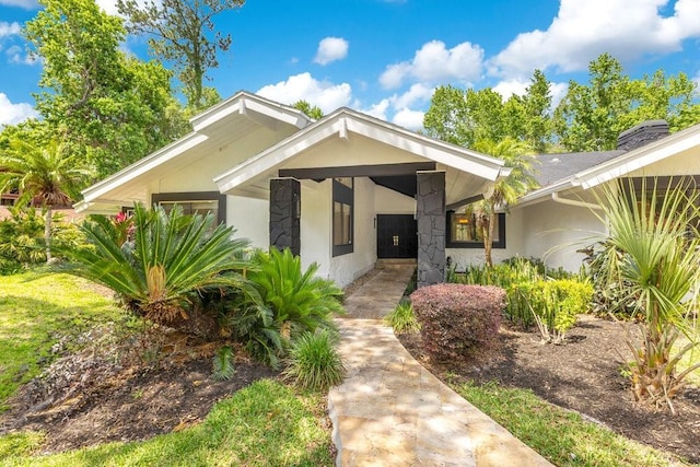 2108 Silver Leaf Ct, Longwood, FL 32779 - view of exterior entry featuring stucco siding and stone siding