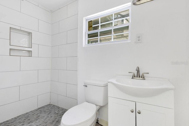 2108 Silver Leaf Ct, Longwood, FL 32779 - bathroom featuring vanity, a tile shower, and toilet