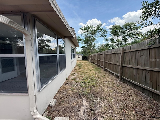 view of yard with fence