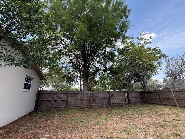 view of yard featuring a fenced backyard