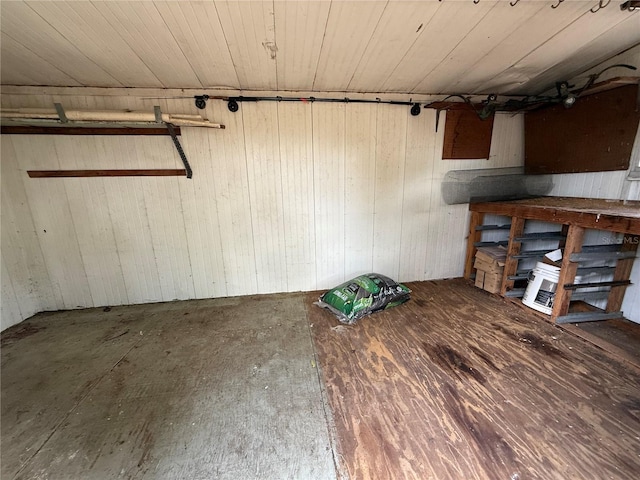 below grade area featuring wood walls