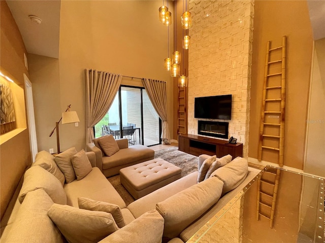 living room with a high ceiling and built in features