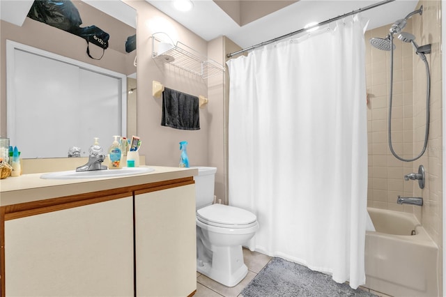 bathroom featuring tile patterned flooring, shower / bath combo, toilet, and vanity