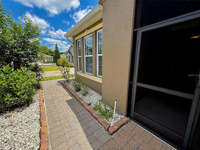 274 Brunswick Dr, Davenport, FL 33837 - view of side of property with stucco siding