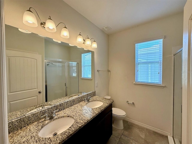 274 Brunswick Dr, Davenport, FL 33837 - bathroom featuring a shower stall, baseboards, toilet, tile patterned flooring, and double vanity