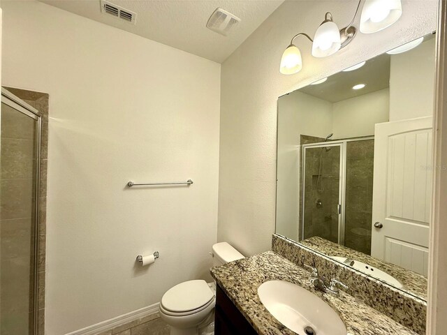 274 Brunswick Dr, Davenport, FL 33837 - bathroom with toilet, a stall shower, vanity, and baseboards