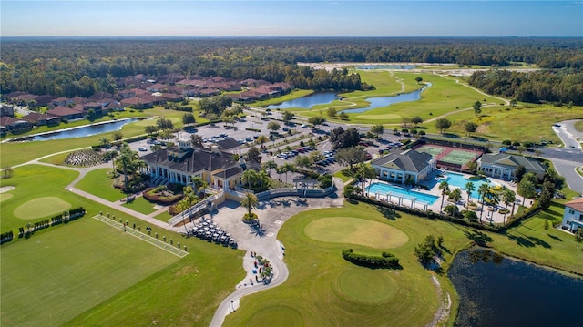 274 Brunswick Dr, Davenport, FL 33837 - drone / aerial view of a nearby body of water, a local golf course, a pool area, and a heavily wooded area